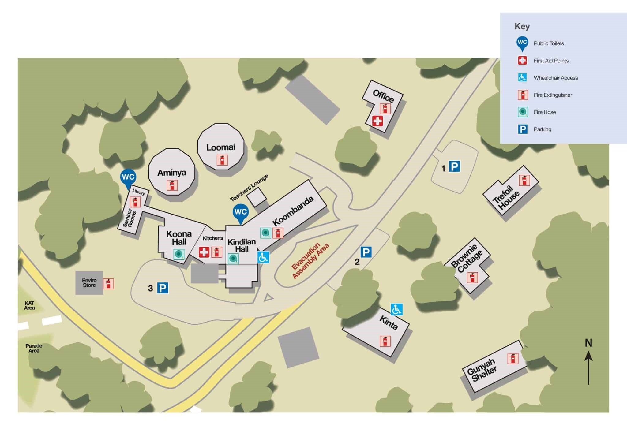 Illustrated map of a park with labeled buildings, roads, and facilities, including symbols for amenities such as restrooms and parking, accompanied by a directional key.